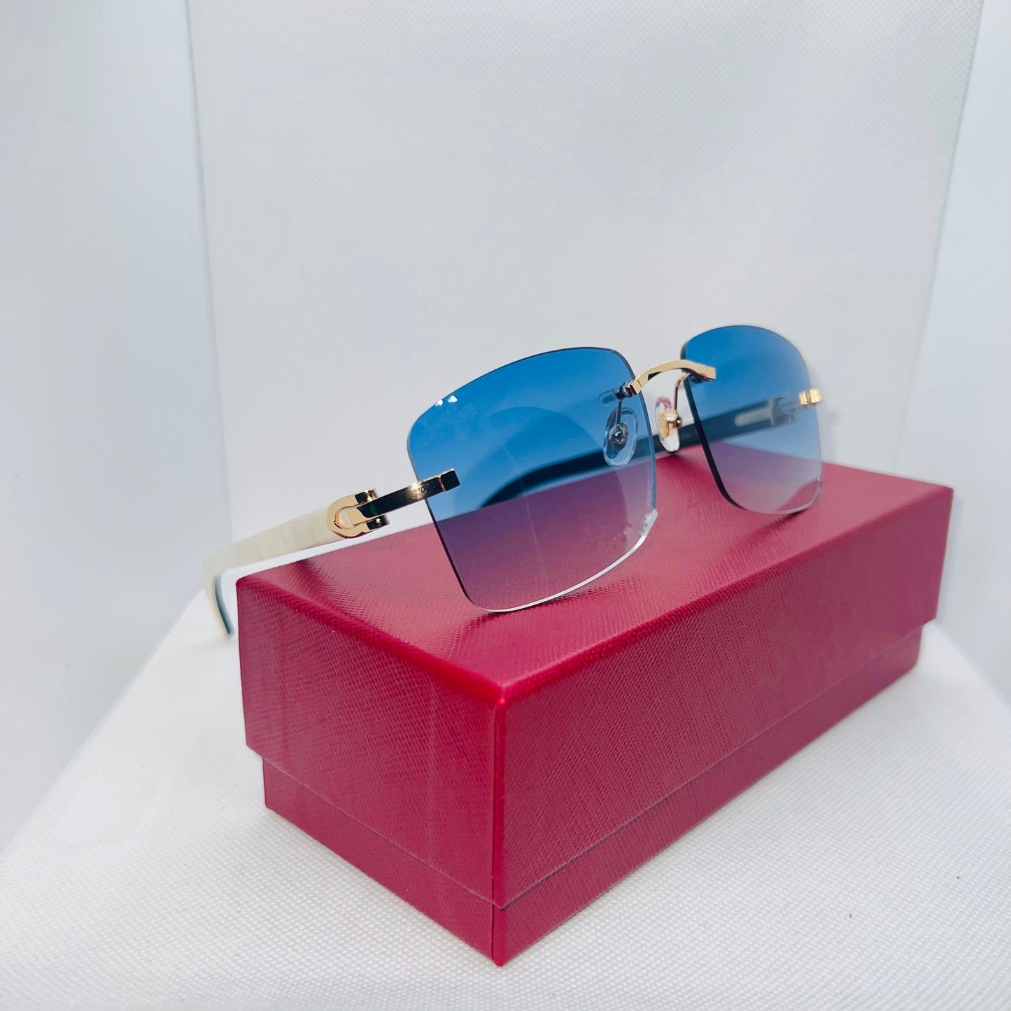 White “Buffs” Gold/White Buffalo Horn Rimless Sunglasses w/ Blue Lenses